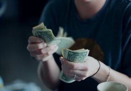 Passion Projects Person counting money